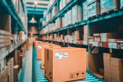 Boxes on a conveyor in a warehouse