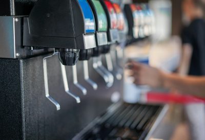 close up of a fountain soda machine