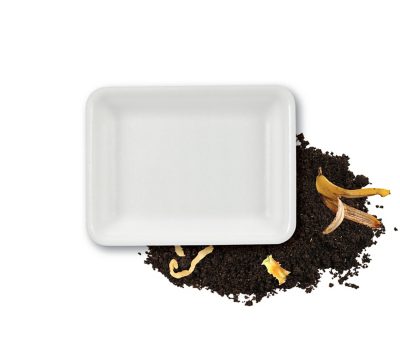 image of white compostable tray with dirt and compost